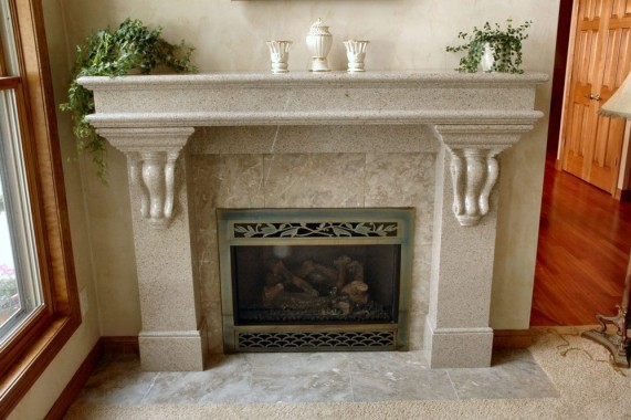 Traditional Fireplace Surround carved of Giallo Granite