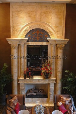 Large decorative carved stone fireplace over-mantel surround with Corinthian columns