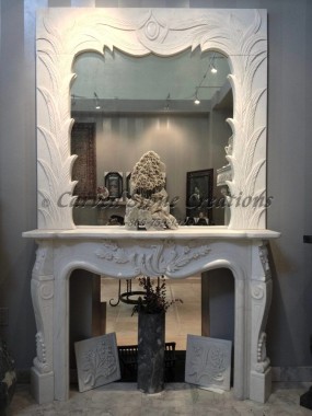 Carved marble French country fireplace mantel