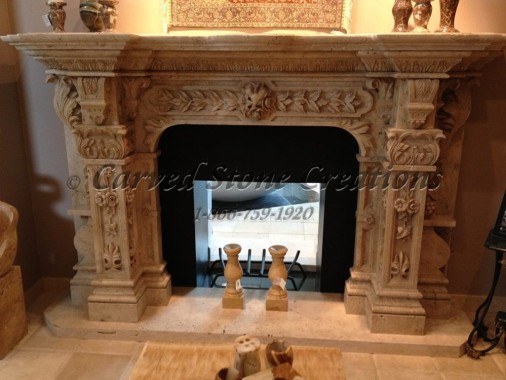 Decorative carved stone fireplace mantel surround
