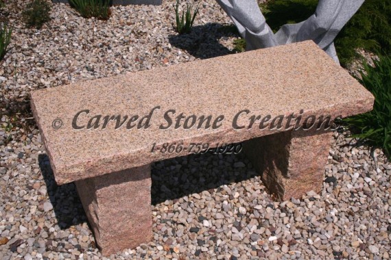 Rustic granite garden bench.