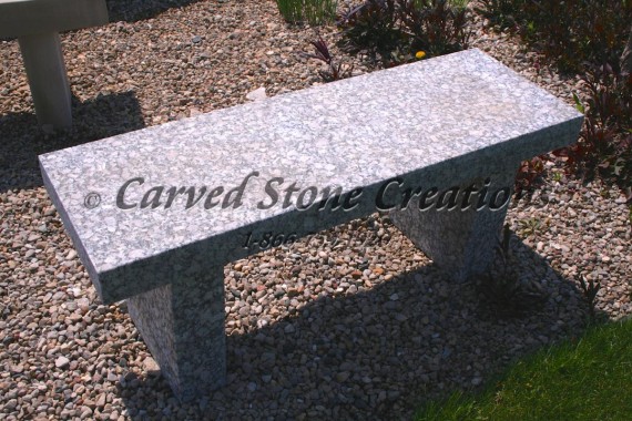 Rustic granite garden bench.