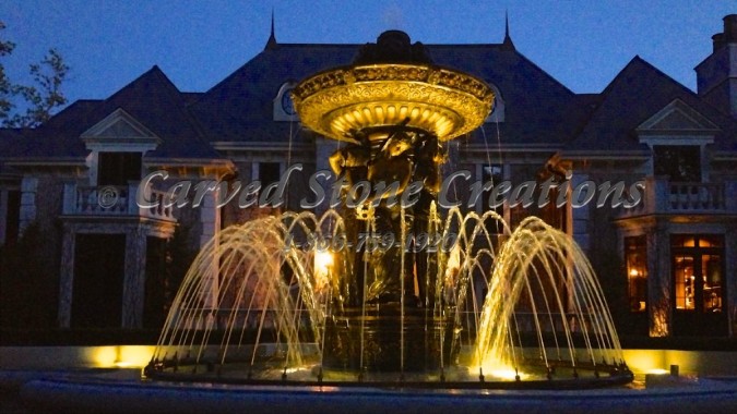 Classical Bronze Fountain at Night