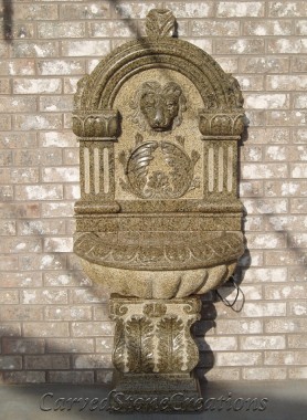 Carved granite pedestal lion wall fountain