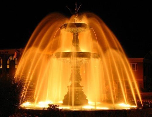 Large outdoor atlas fountain with lights
