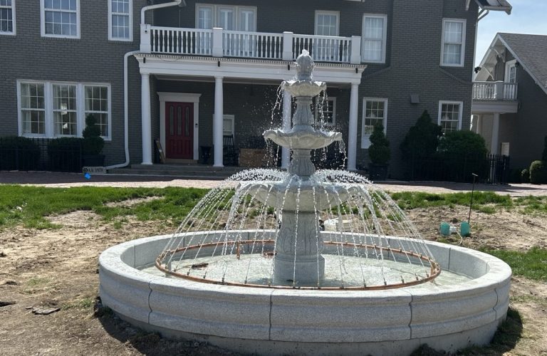 3-tier Scalloped Fountain carved of California white granite, 54" diameter x 96" tall in a 14' Diameter x 14" tall Tuscan Pool surround