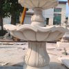 3-Tier Scallloped fountain, carved of Golden Cypress granite, 54" diameter x 96" tall