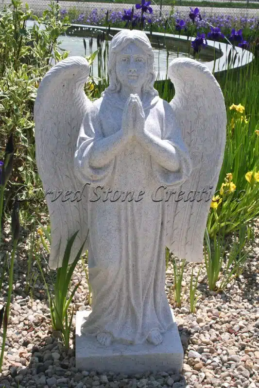 Praying angel statue