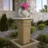Tolken Fountain with pink flowers