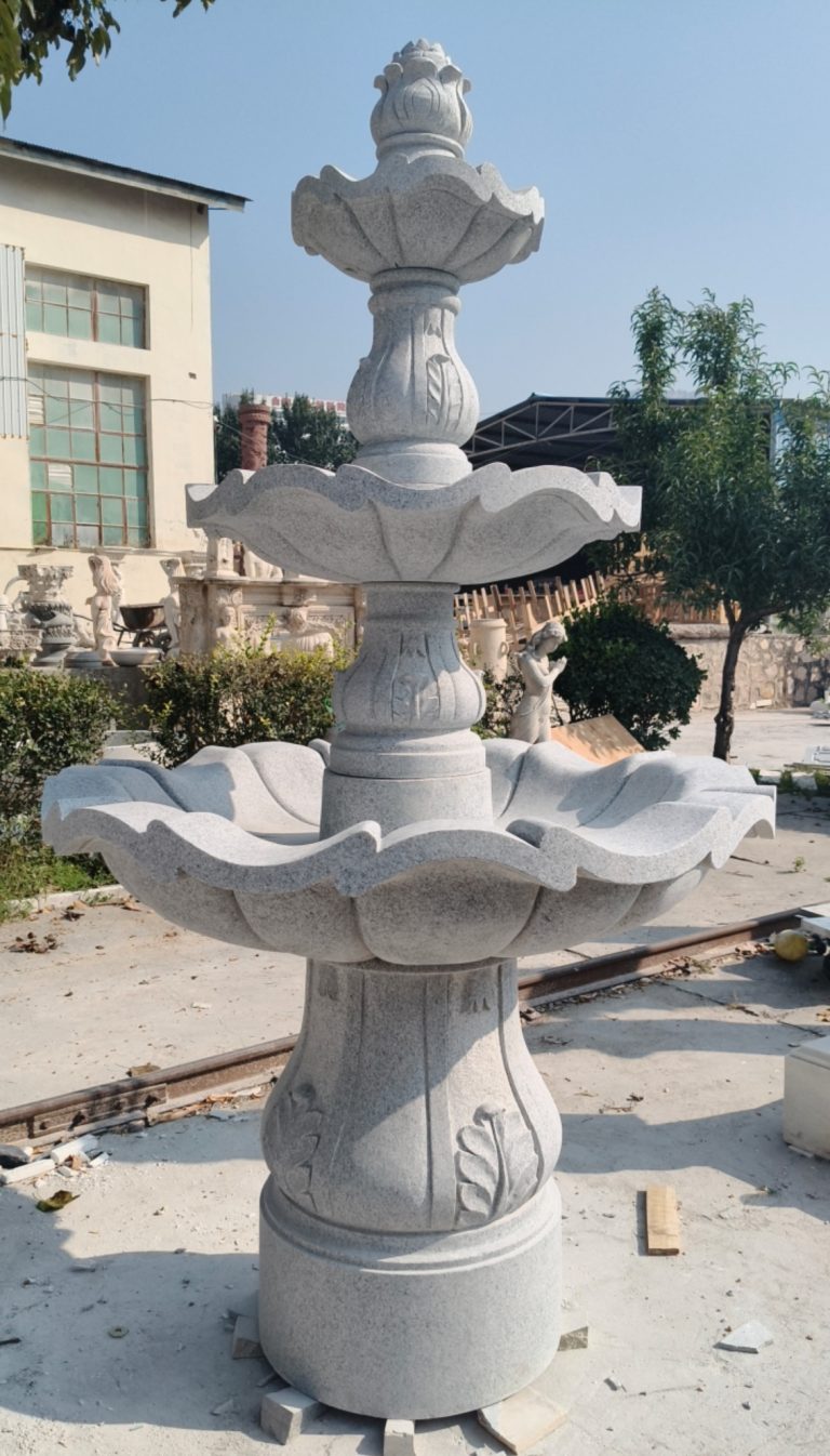 3-tier Scalloped fountain (54" diameter x 96" tall) carved of Light Charcoal Grey Granite