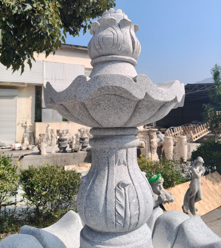3-tier Scalloped fountain (54" diameter x 96" tall) carved of Light Charcoal Grey Granite