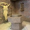 Octaogonal Baptismal Font, carved of Red B Granite