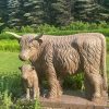 Scottish Highland Cow Statue, carved of Red B Granite