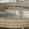 14' diameter x 14" tall relief carved pool surround, carverd of golden cyrpess granite